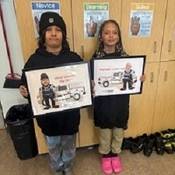 Les gagnants du concours avec des plaques