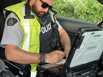 Richmond RCMP officer writing a ticket