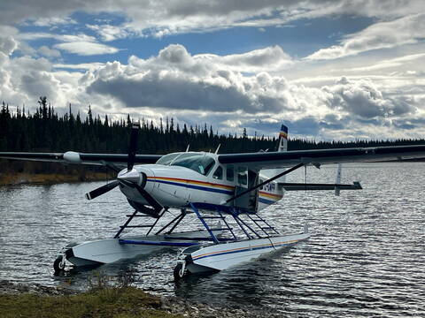The RCMP Float Plane on the shore of a remote lake in the Skeena Region
