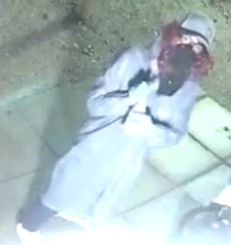 Spruce Plains RCMP are looking for this disguised suspect, who spray-painted over a Rapid City store's outdoor security cameras on May 23.