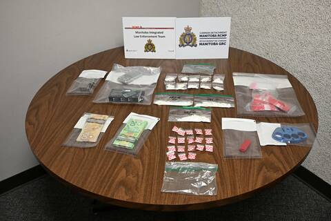 Carman RCMP and MILET officers executed a search warrant in the RM of Dufferin on Oct. 17, seizing cocaine, a weapon, cash and drug trafficking paraphernalia.