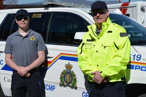 Photo of Alex and Doug, the Auxiliary members attending the RCMP event at OKM.