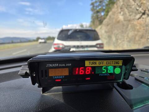 A radar unit shows a speed of 168 km/h on the dash of a BC Highway Patrol cruiser