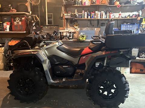 A photo of the stolen ATV, a grey Can Am Outlander