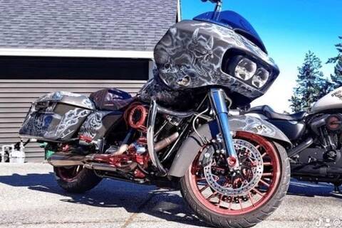 A custom Harley-Davidson with skull-and-smoke paint