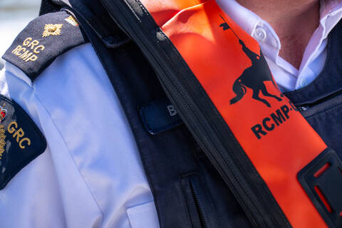 RCMP officer wearing personal floatation device