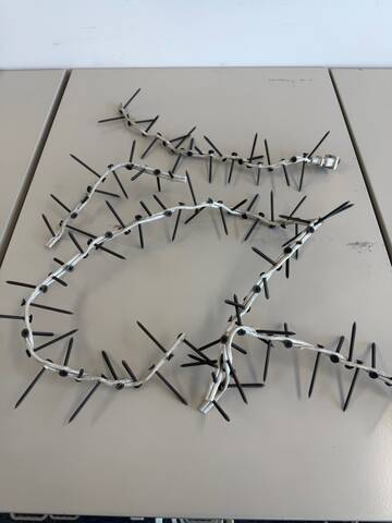 A photograph of the five recovered homemade tire deflation devices