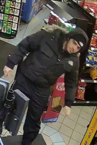 Suspect wearing black jacket