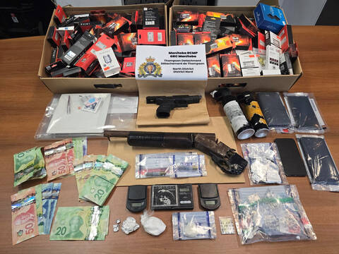 RCMP in Thompson seized weapons, drugs and cash after executing a search warrant at a residence on April 1.
