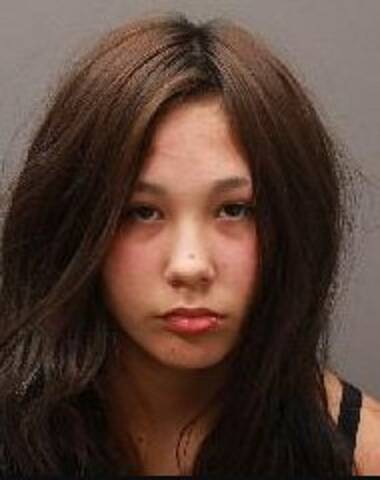 A head and shoulders photo of Marissa Wilson with long brown hair and brown eyes.