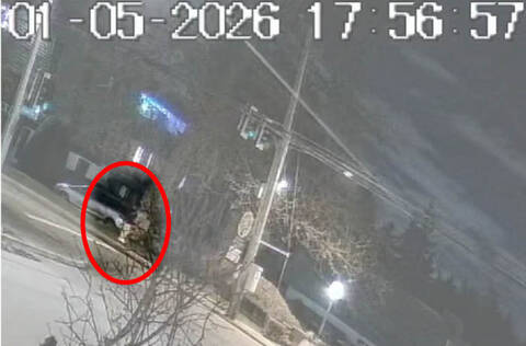 Screenshot of surveillance video with witness circled in red